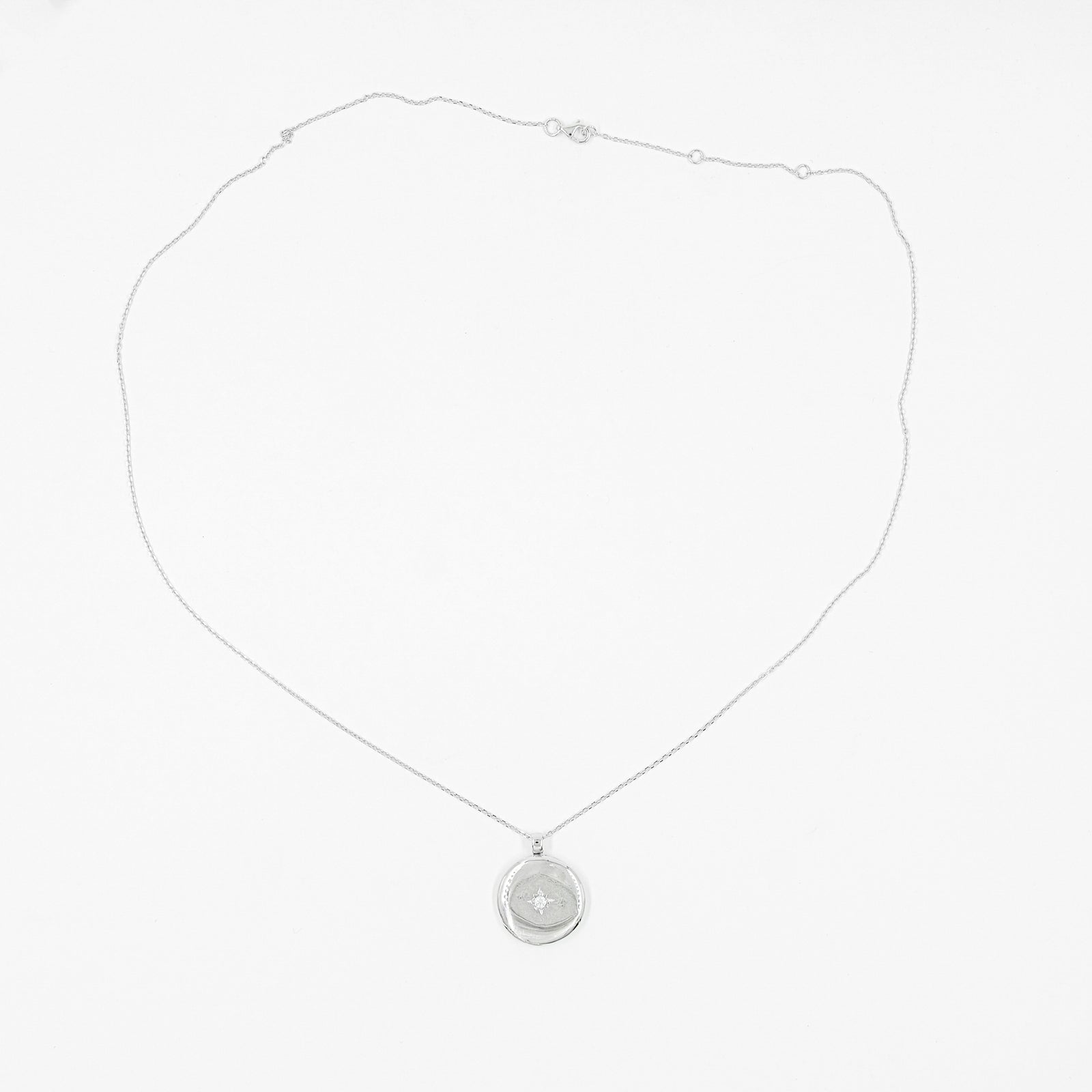 Colgante Reliquiario y Estrella Moissanita